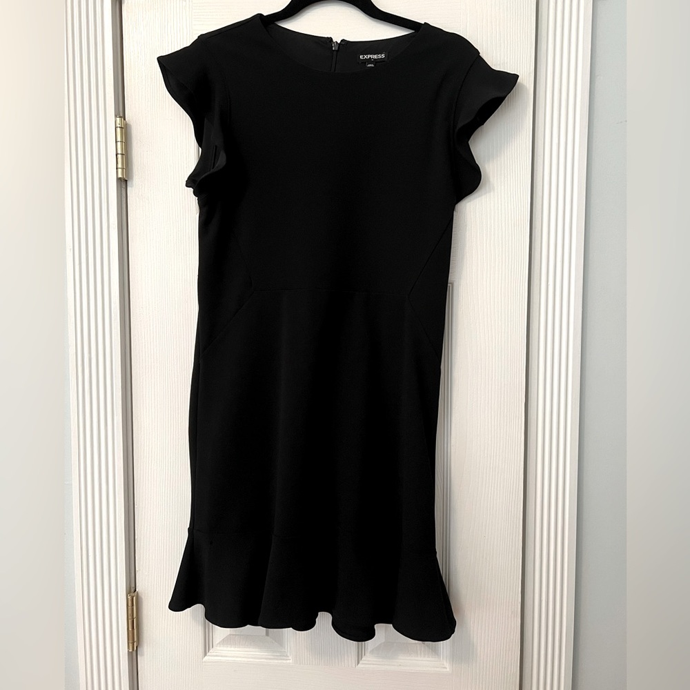 Express form fitting black dress with cap sleeves